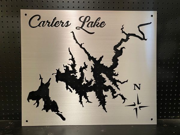 Carters Lake custom metal map with compass rose on a perforated black background.