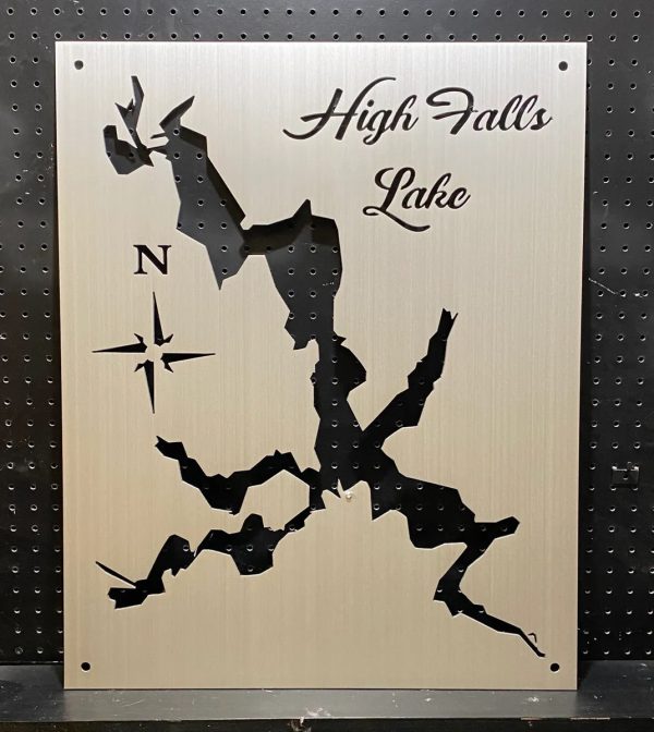 High Falls Lake metal map with compass design, mounted on a perforated black background.