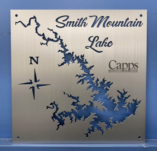 Smith Mountain Lake map sign with compass rose and "Capps Home Building Center" logo on a blue background.